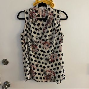 Sleeveless polka dot and floral blouse